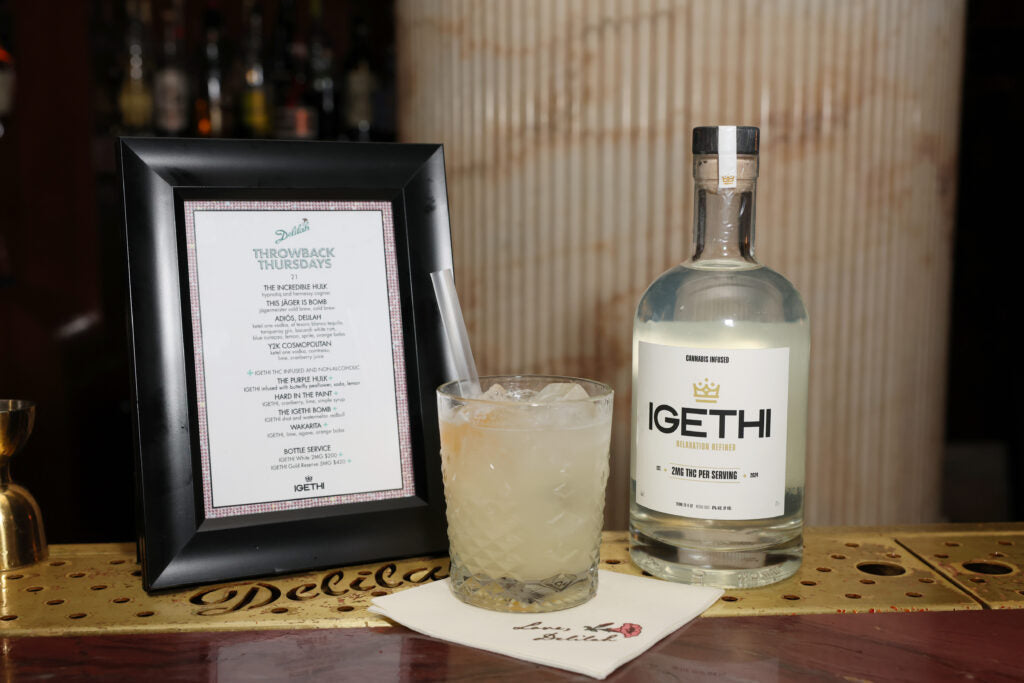 IGETHI Bottle Next To Drink And Menu