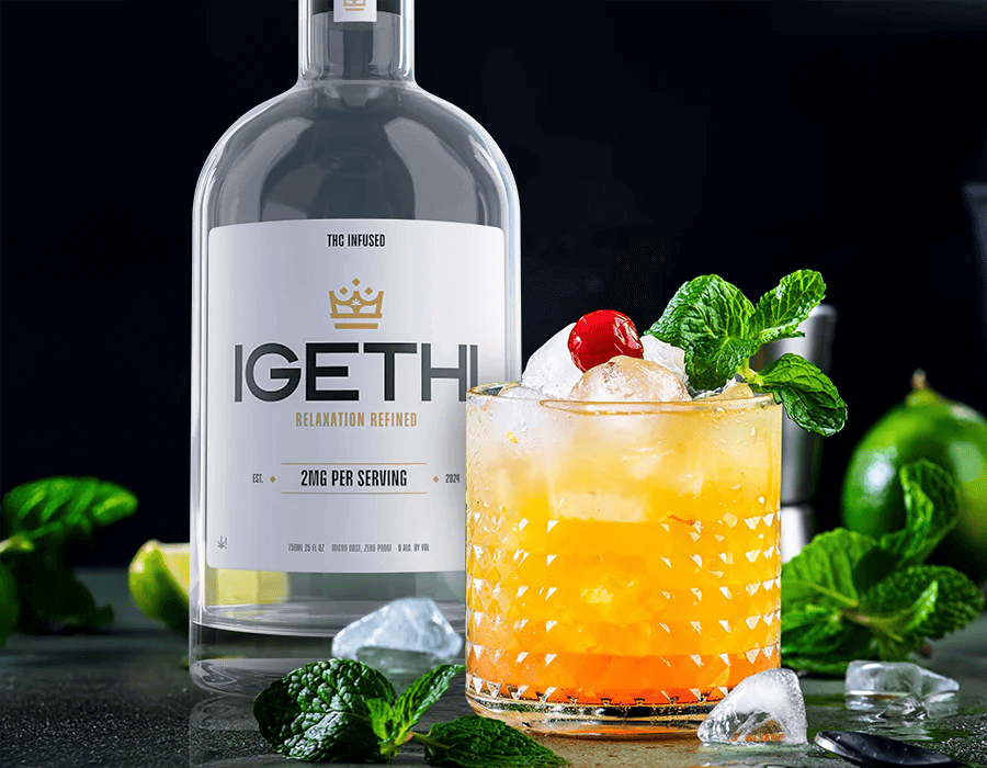 Glass Filled With IGETHI Drink With Mint Leaves