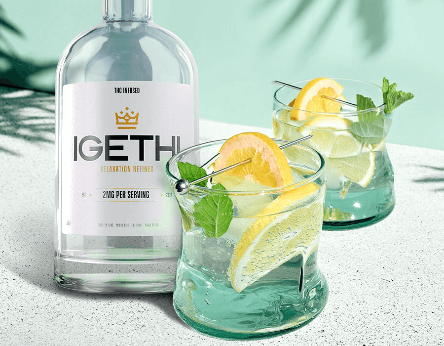 Glass Filled With IGETHI Drink With Lemon On Top