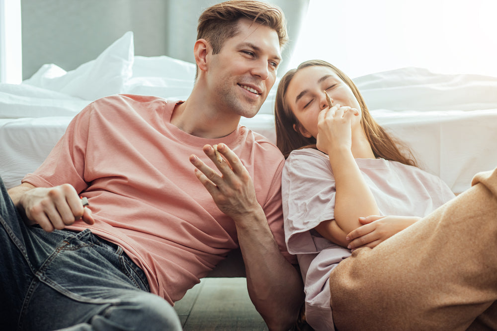 Couple Sitting On Couch