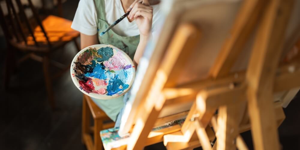 Lady Painting On Canvas